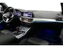 BMW 3-Serie 330e xDrive M Sport / M340i Diffuser / Black Diamond M Grill / M340i M Sport bumper pakket / Schuif-/kanteldak / Premium kleur Dravitgrau / Apple Carplay - Android Auto / Stoelverwarming / Ambienteverlichting / 19'' LMV / Stuurwiel verwarming / Full LED / Keyless / Koplamp BMW Individual Shadow Line / Draadloze telefoonlader / Active Cruise Control / Navigatie / DAB+