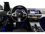 BMW 3-Serie 330e xDrive M Sport / M340i Diffuser / Black Diamond M Grill / M340i M Sport bumper pakket / Schuif-/kanteldak / Premium kleur Dravitgrau / Apple Carplay - Android Auto / Stoelverwarming / Ambienteverlichting / 19'' LMV / Stuurwiel verwarming / Full LED / Keyless / Koplamp BMW Individual Shadow Line / Draadloze telefoonlader / Active Cruise Control / Navigatie / DAB+