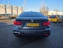 BMW 3-Serie Gran Turismo 320i High Executive Edition | Met o.a. lederen bekleding, panoramadak, achteruitrijcamera en cruise!