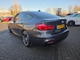 BMW 3-Serie Gran Turismo 320i High Executive Edition | Met o.a. lederen bekleding, panoramadak, achteruitrijcamera en cruise!