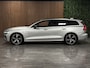 Volvo V60 T6 AWD Recharge R-Design Schuifdak | Harman Kardon | Adaptieve Cruise Control | Standkachel met Volvo On Call App | Stoelverwarming | Parkeercamera | Pilot Assisst | BLIS Dode Hoek Detectie | Bestuurdersstoel elektrisch geheugen | Contour stoelen leder | Zitting verlenging voorstoelen | 19 Inch | Keyless Drive | Parkeersensoren voor+achter | Privacy Glass | Elektrisch bedienbare achterklep | DAB Radio | Apple Carplay/Android Auto | Bright Silver Metallic |