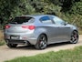 Alfa Romeo Giulietta 1.7 TBi Quadrifoglio Verde | Matt grijs | Bose | Leder / alcantara | Navi | Clima | Cruise | Stoelverw. |