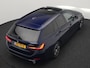 BMW 3-Serie Touring 320e Plug In Hybrid 204pk Dealer O.H. PHEV | Panodak | Widescreen Navi | Camera | Lederen Sportstoelen Verwarmd | Sfeerverlichting | Apple Carplay | Navigatie | Virtual | DAB | Tansanitblau II Metallic |