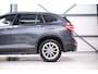 BMW X1 sDrive18i High Executive | 1e eigenaar | Dealer OH | Trekhaak | Leder | Sportstoelen | HUD | Stoelverwarming | Clima | LED |