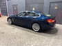 BMW 4-Serie Gran Coupe 420i Centennial Executive | Schuif/Kanteldak | Leder | Harman/Kardon | Camera