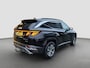 Hyundai Tucson 1.6 T-GDI HEV 230pk Comfort | Climate controle | Trekhaak | Camera | Carplay | Adaptive cruise controle | Draadloos laden | Keyless entry | Navigatie | Parkeersensoren | Stoelverwarming