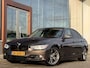 BMW 3-Serie 320i High Executive | Harman/Kardon | Leder | V + A Parkeersensoren | Schakelflippers |