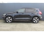 Volvo XC40 1.5 T4 Recharge R-Design | Incl. 12 maanden garantie | Harman/Kardon audio | Schuif/kantel dak | Apple carplay/Android auto | Stuurwiel verwarming | Voorstoelen verwarmd | DAB | Navigatie | Lichtmetalen velgen | Climate control | Zwart dakhemel