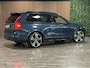 Volvo XC90 T8 AWD Recharge Ultra Dark Black Vol! | Bowers & Wilkins | Luchtvering | Stoelventilatie | Trekhaak | 360 Camera | Head-Up Display | Stoelmassage | 455pk | Adaptieve Cruise Control | Stoelverwarming voor+achter | Stuurwielverwarming | Schuifdak | 22 Inch | Full LED Meesturende koplampen | Pilot Assist | BLIS Dode Hoek Detectie | Alcantara hemelbekleding | Lederen handgrepen en zonnekleppen | Elektrische voorstoelen geheugen | Nappa Lederen bekleding | Zitting verlenging voorstoelen | Geïntegreerde runningboards in zwart | Keyless Drive | Parkeersensoren voor+achter | Privacy Glass | Elektrisch bedienbare achterklep | Geïntegreerde zongordijnen achterportieren | Geïntegreerd kinderzitje achterin | Verlichte instaplijsten | 7-Persoons | 4-Zone Climate Control | DAB Radio | Apple Carplay/Android Auto | Alarm Klasse III | Draadloos telefoon opladen | Volvo On Call met mobiele App functie | Denim Blue Metallic |
