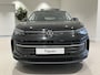 Volkswagen Tiguan 1.5 eTSI Life Edition 150 PK | Apple Carplay | Panoramadak | Trekhaak | Stoelverwarming | Dodehoeksensoren | Stuurwielverwarming | Achteruitrijcamera | Park Assist | Sfeerverlichting | 19'' Lichtmetalen Catania Velgen | Elektrische Achterklep | Rijstrookhulp | Adaptive Cruise Control | Elektrische Lendensteun |