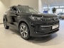 Volkswagen Tiguan 1.5 eTSI Life Edition 150 PK | Apple Carplay | Panoramadak | Trekhaak | Stoelverwarming | Dodehoeksensoren | Stuurwielverwarming | Achteruitrijcamera | Park Assist | Sfeerverlichting | 19'' Lichtmetalen Catania Velgen | Elektrische Achterklep | Rijstrookhulp | Adaptive Cruise Control | Elektrische Lendensteun |