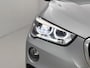 BMW X1 sDrive18i High Executive | AUTOMAAT | PANORAMADAK | HEAD-UP DISPLAY | STOELVERWARMING | ACHTERUITRIJCAMERA | TREKHAAK | ELEKTRISCHE ACHTERKLEP |