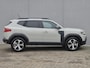 Dacia Duster 1.6 Hybrid 140 Journey Automaat / Fabrieksgarantie tot 04-2028<100.000 / Pack parking / Pack Winter / Draadloze telefoon lader / Apple Carplay/Android Auto / Cruise control / Climate control / Stuur & Stoelverwarming /