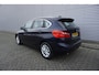 BMW 2-Serie Active Tourer 218i Centennial Executive Climate / Navi / Cruise / Led / Lm velgen