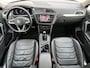 Volkswagen Tiguan 1.4 TSI eHybrid Business Plug-In / Dealer onderhouden / 1.800 kg trekgewicht / 245 PK / Panorama schufdak / Leder comfortstoelen met Memory / Virtual Cockpit / Stuur- en stoelverwarming / Camera 360° / 18"LM wielen/
