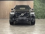 Volvo XC90 T8 AWD Recharge R-Design Long Range Trekhaak | 455pk | Adaptieve Cruise Control | Stoel en Stuurwielverwarming | Parkeercamera | Full LED Meesturende koplampen | Pilot Assist | BLIS Dode Hoek Detectie | Elektrische voorstoelen geheugen | Leder Alcantara R-Design Contour stoelen wit stiksel met bies | Zitting verlenging voorstoelen | Lederen dashboard | 20 Inch | Keyless Drive | Parkeersensoren voor+achter | Elektrisch bedienbare achterklep | Geïntegreerde zongordijnen achterportieren | Verlichte instaplijsten | 7-Persoons | 4-Zone Climate Control | DAB Radio | Apple Carplay/Android Auto | Volvo On Call met mobiele App functie | Onyx Black Metallic |