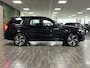Volvo XC90 T8 AWD Recharge R-Design Long Range Trekhaak | 455pk | Adaptieve Cruise Control | Stoel en Stuurwielverwarming | Parkeercamera | Full LED Meesturende koplampen | Pilot Assist | BLIS Dode Hoek Detectie | Elektrische voorstoelen geheugen | Leder Alcantara R-Design Contour stoelen wit stiksel met bies | Zitting verlenging voorstoelen | Lederen dashboard | 20 Inch | Keyless Drive | Parkeersensoren voor+achter | Elektrisch bedienbare achterklep | Geïntegreerde zongordijnen achterportieren | Verlichte instaplijsten | 7-Persoons | 4-Zone Climate Control | DAB Radio | Apple Carplay/Android Auto | Volvo On Call met mobiele App functie | Onyx Black Metallic |