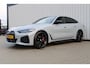 BMW i4 M50 High Executive 84 kWh | Incl. 12 maanden garantie | Assisted driving | Climate control | 360° camera | Uitklapbare trekhaak | Stoel/stuurverwarming | Head-up display | Schuif/kantel dak |