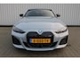 BMW i4 M50 High Executive 84 kWh | Incl. 12 maanden garantie | Assisted driving | Climate control | 360° camera | Uitklapbare trekhaak | Stoel/stuurverwarming | Head-up display | Schuif/kantel dak |