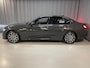 BMW 3-Serie 320e High Executive 18"/Leder/Laser LED/Stuur + stoelverwarming/Dodehoek/Elektrische klep/Trekhaak/Hed-up/Keyless