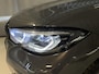 BMW 3-Serie 320e High Executive 18"/Leder/Laser LED/Stuur + stoelverwarming/Dodehoek/Elektrische klep/Trekhaak/Hed-up/Keyless