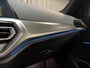 BMW 3-Serie 320e High Executive 18"/Leder/Laser LED/Stuur + stoelverwarming/Dodehoek/Elektrische klep/Trekhaak/Hed-up/Keyless