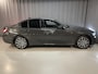 BMW 3-Serie 320e High Executive 18"/Leder/Laser LED/Stuur + stoelverwarming/Dodehoek/Elektrische klep/Trekhaak/Hed-up/Keyless