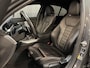 BMW 3-Serie 320e High Executive 18"/Leder/Laser LED/Stuur + stoelverwarming/Dodehoek/Elektrische klep/Trekhaak/Hed-up/Keyless