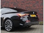 BMW 4-Serie Coupé 420i | M-Sport - HUD - Schuifdak