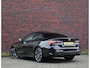 BMW 4-Serie Coupé 420i | M-Sport - HUD - Schuifdak