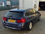 BMW 3-Serie Touring 320d High Executive / Adaptive Cruise / Sportinterieur!