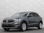 Volkswagen T-Roc 1.5 TSI 150pk DSG | ACC | Origineel NL | BOVAG Garantie | Trekhaak 1500kg | Camera | Lane Assist | Groot Navi | Carplay | Climate Control | Getint Glas | 17'' | Adaptieve Cruise Control | Parkeercamera | Caravantrekker!
