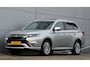 Mitsubishi Outlander PHEV 2.4 INSTYLE 4WD | PLUG IN HYBRID | V2G | FULL OPTIONS | SCHUIFDAK | ADAPTIEF CRUISE | TREKHAAK 1500KG | FABRIEKSGARANTIE TOT 09-2029* | ALL IN RIJKLAARPRIJS