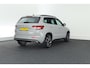 Skoda Karoq 1.5 TSI 150pk DSG Sportline Business Panoramadak Stoelverwarming Navigatie Canton Audio Camera Keyless Virtual Cockpit