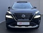Nissan X-Trail 1.5 e-Power Tekna Automaat / Fabrieksgarantie tot 03-2028 < 100.000km / Leder / Panorama schuifdak / Elektrische stoelen en klep / Stuur-, stoel- & achterbankverwarming / Navi / HUD / Camera 360° / LM 19" wielen + All Season banden /