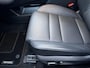 Nissan X-Trail 1.5 e-Power Tekna Automaat / Fabrieksgarantie tot 03-2028 < 100.000km / Leder / Panorama schuifdak / Elektrische stoelen en klep / Stuur-, stoel- & achterbankverwarming / Navi / HUD / Camera 360° / LM 19" wielen + All Season banden /