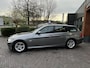 BMW 3-Serie Touring 320d Efficient Dynamics Edition Luxury Line Sportstoelen Navigatie PDC Cruise Xenon Trekhaak