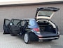 BMW 5-Serie Touring 520d High Executive | Panoramadak | Luxury line | 360 Camera | Head-up Display