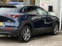 Mazda CX-30 2.0 e-SkyActiv-X M Hybrid Luxury | NAP | elektrisch glazen schuif-/kanteldak | Leer | Stoel & stuur verwarming | 360 graden camera | Bose Audio | Memory Stoelen |