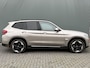 BMW iX3 BWJ 2021 80 KWh High Executive 286 PK PANODAK | FULL LED | LEDER | STOELVERW. | ADAPTIVE CRUISE | CAMERA | HARMAN&KARDON | HEAD-UP DISPLAY | ELEKR. STOELEN | CARPLAY + ANDROID | NAVI | CLIMA | LMV