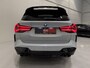 BMW X3 xDrive30e M-Sport Facelift PERFORMANCE BODYKIT BROOKLYN-GRAU/PANO/H&K/HEAD-UP/LASER/CAMERA/KEYLESS/21"M-SPORT/TREKHAAK ELECTR./ADAPTIVE-ONDERSTEL/LEER-GEPERFOREERD/UNIEKE AUTO/NET OH BEURT GEHAD/AUTO VERKEERT IN ABSOLUTE NIEUWSTAAT