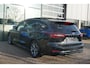 Ford Focus Wagon 1.0 EcoBoost Hybrid ST Line X 155PK Automaat Afn. Trekhaak Panodak Winterpack Adaptieve Cruise Camera Blind-Spot Parkeersensoren Keyless B&O Full-LED Climate *Compleet*