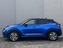 Nissan Juke 1.6 Hybrid N-Connecta Automaat / Fabrieksgarantie tot 08-2027 / Dealer onderhouden / Afn. trekhhaak 750 kg / Stuur-, stoel & voorruitverwarming / Camera  360° / Navigatie / Adapt. CC / Apple Carplay Android / 17" LM wielen /