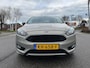 Ford Focus Wagon 1.0 Titanium ST-Line / airco / cruise.control / key.less / navigatie / pdc / lmv / nap….
