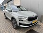 Skoda Karoq 1.0 TSI Ambition / PANO/ STUUR+STOEL VERWARMING/ PARK.SENSOREN V+A/ CAMERA/ ACC/ SMARTLINK/ NAVI/ DIGITAL DASH/ DAB/ CLIMA/ LED/ ISOFIX/ 17'' LMV