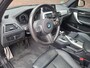 BMW 1-Serie 118i Edition M Sport Shadow Line Panoramadak / Apple Carplay / Stoelverwarming / Cruise Controle /