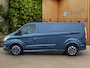 Ford Transit Custom 320 2.0 TDCI L2H1 Sport | Vloer + Wandbekleding | Trekhaak | Stoelverwarming | Xenon | 17''