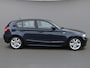 BMW 1-Serie 120i Anniversary | Clima | Cruise | Multimedia/Navi | Leder | Stoelverwarming | PDC |