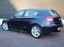BMW 1-Serie 120i Anniversary | Clima | Cruise | Multimedia/Navi | Leder | Stoelverwarming | PDC |