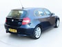 BMW 1-Serie 120i Anniversary | Clima | Cruise | Multimedia/Navi | Leder | Stoelverwarming | PDC |